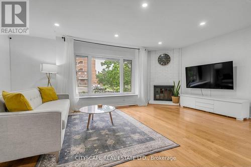 16 - 149 Maple Branch Path, Toronto, ON - Indoor Photo Showing Living Room With Fireplace