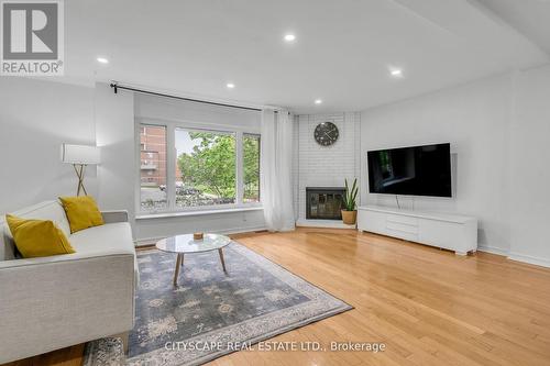 16 - 149 Maple Branch Path, Toronto, ON - Indoor Photo Showing Living Room With Fireplace