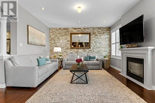 358 Malboeuf Court, Milton, ON - Indoor Photo Showing Living Room With Fireplace