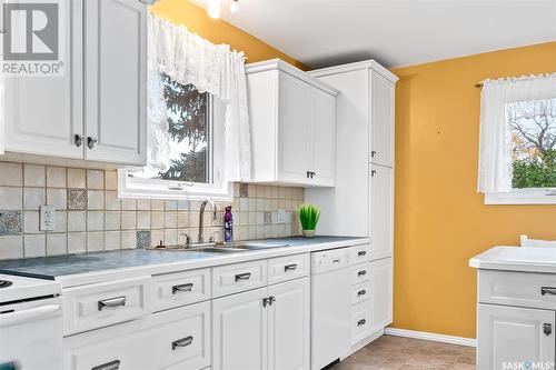 124 2Nd Avenue, Mortlach, SK - Indoor Photo Showing Kitchen With Double Sink