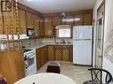 58 Helena Street, Prud'Homme, SK  - Indoor Photo Showing Kitchen With Double Sink 