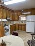 58 Helena Street, Prud'Homme, SK  - Indoor Photo Showing Kitchen With Double Sink 