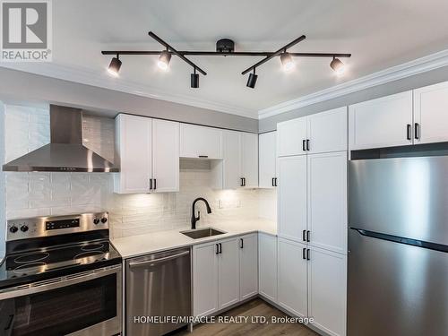 604 - 1270 Maple Crossing Boulevard, Burlington, ON - Indoor Photo Showing Kitchen With Upgraded Kitchen