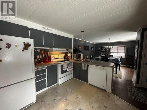 8 Fediw Road, Fort Nelson, BC - Indoor Photo Showing Kitchen