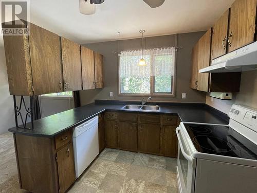 5316 Willow Road, Fort Nelson, BC - Indoor Photo Showing Kitchen With Double Sink