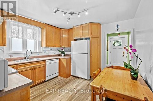 27 Stock Avenue, Toronto, ON - Indoor Photo Showing Kitchen With Double Sink