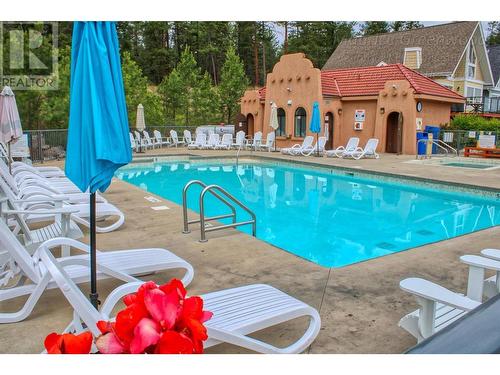 6897 Santiago Loop Unit# 100, Kelowna, BC - Outdoor With In Ground Pool With Deck Patio Veranda