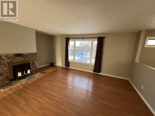 5320 Tamarack Crescent, Fort Nelson, BC - Indoor With Fireplace