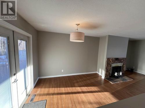 5320 Tamarack Crescent, Fort Nelson, BC - Indoor With Fireplace