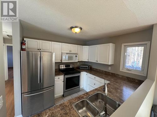 5320 Tamarack Crescent, Fort Nelson, BC - Indoor Photo Showing Kitchen