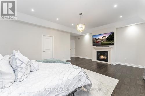 91 Woodgate Pines Drive, Vaughan, ON - Indoor Photo Showing Bedroom With Fireplace