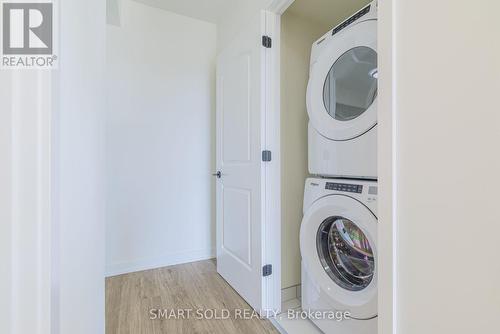 #404 - 345 Wheat Boom Drive, Oakville, ON - Indoor Photo Showing Laundry Room