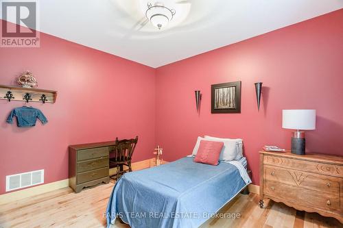 697 Lafontaine Road E, Tiny, ON - Indoor Photo Showing Bedroom