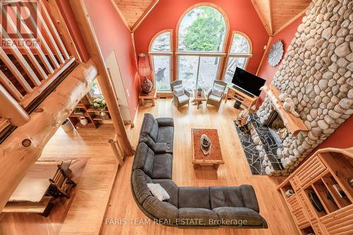 697 Lafontaine Road E, Tiny, ON - Indoor Photo Showing Living Room With Fireplace