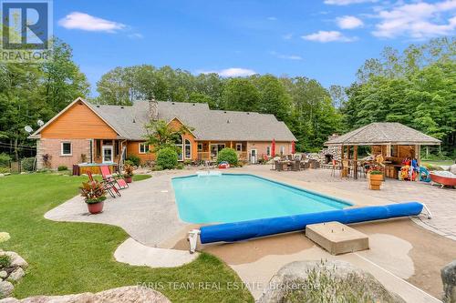 697 Lafontaine Road E, Tiny, ON - Outdoor With In Ground Pool With Backyard