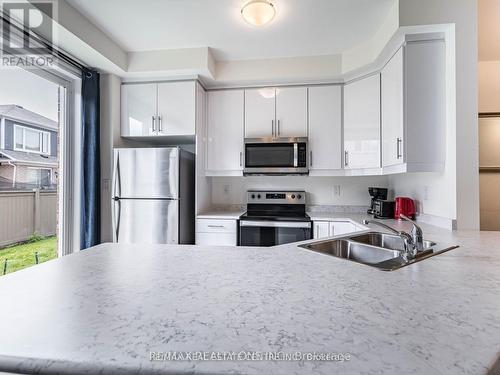 86 - 975 Whitlock Avenue, Milton, ON - Indoor Photo Showing Kitchen With Stainless Steel Kitchen With Double Sink