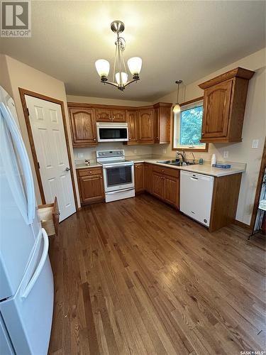 206 4Th Avenue E, Kelvington, SK - Indoor Photo Showing Kitchen With Double Sink