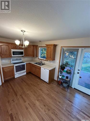 206 4Th Avenue E, Kelvington, SK - Indoor Photo Showing Kitchen With Double Sink