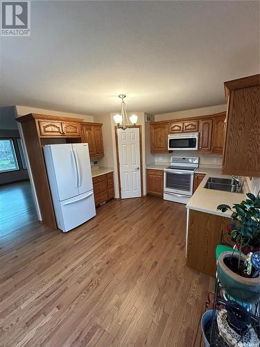 206 4Th Avenue E, Kelvington, SK - Indoor Photo Showing Kitchen With Double Sink