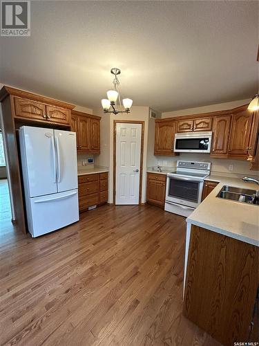 206 4Th Avenue E, Kelvington, SK - Indoor Photo Showing Kitchen With Double Sink