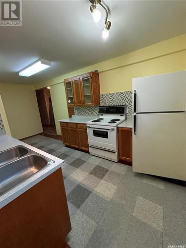 206 4Th Avenue E, Kelvington, SK - Indoor Photo Showing Kitchen With Double Sink