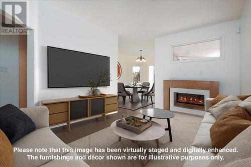 1914 Webster Boulevard, Innisfil, ON - Indoor Photo Showing Living Room With Fireplace