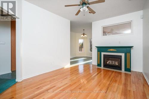 1914 Webster Boulevard, Innisfil, ON - Indoor Photo Showing Living Room With Fireplace