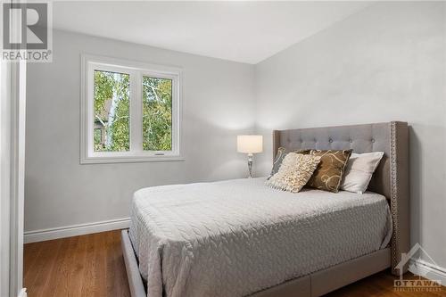 second bedroom upstairs with lots of closet space - 17 Welby Court, Ottawa, ON - Indoor Photo Showing Bedroom