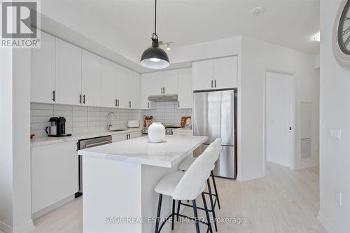 1918 - 9000 Jane Street, Vaughan, ON - Indoor Photo Showing Kitchen With Stainless Steel Kitchen With Upgraded Kitchen