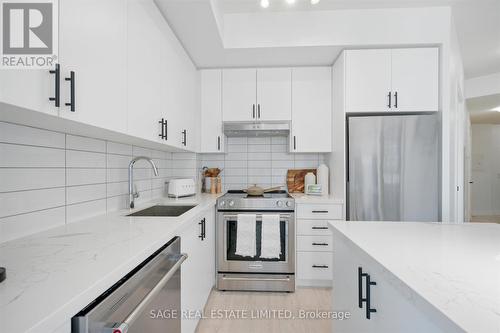 1918 - 9000 Jane Street, Vaughan, ON - Indoor Photo Showing Kitchen With Upgraded Kitchen