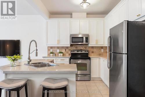 2404 Whistling Springs Crescent, Oakville, ON - Indoor Photo Showing Kitchen With Stainless Steel Kitchen With Double Sink