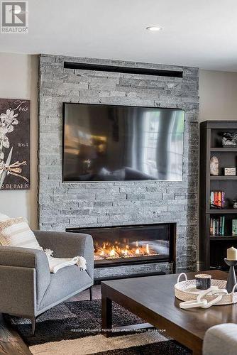 4310 Line 6, Bradford West Gwillimbury, ON - Indoor Photo Showing Living Room With Fireplace