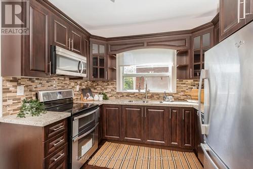 15 Corbett Avenue, Toronto, ON - Indoor Photo Showing Kitchen With Double Sink With Upgraded Kitchen