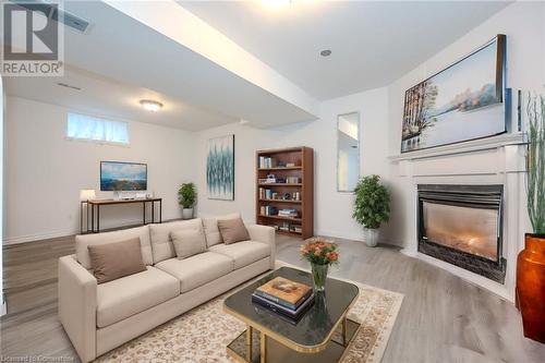 VIRTUALLY STAGED - 49 Dawn Ridge Drive, Kitchener, ON - Indoor Photo Showing Living Room With Fireplace