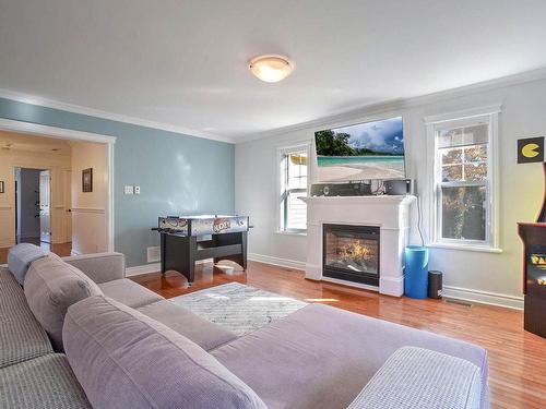 Playroom - 160 Rue Des Méandres, Saint-Jérôme, QC - Indoor Photo Showing Living Room With Fireplace