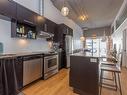 Kitchen - 306-240 Ch. Bates, Mont-Royal, QC  - Indoor Photo Showing Kitchen With Upgraded Kitchen 