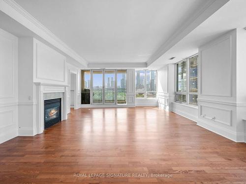 909-25 Scrivener Sq, Toronto, ON - Indoor Photo Showing Living Room With Fireplace