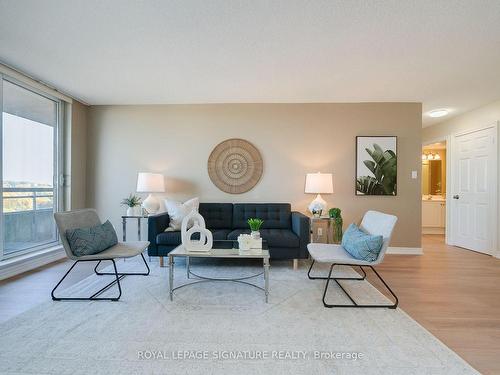 803-1700 Eglinton Ave E, Toronto, ON - Indoor Photo Showing Living Room