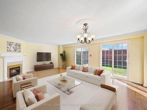 89 Stornwood Crt, Brampton, ON - Indoor Photo Showing Living Room With Fireplace