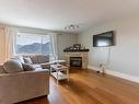 406-875 Sahali Terrace, Kamloops, BC  - Indoor Photo Showing Living Room With Fireplace 