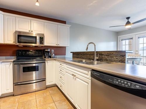 406-875 Sahali Terrace, Kamloops, BC - Indoor Photo Showing Kitchen With Double Sink