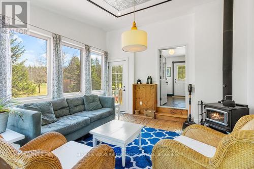 123 Valley Ridge Road, Grey Highlands, ON - Indoor Photo Showing Living Room With Fireplace