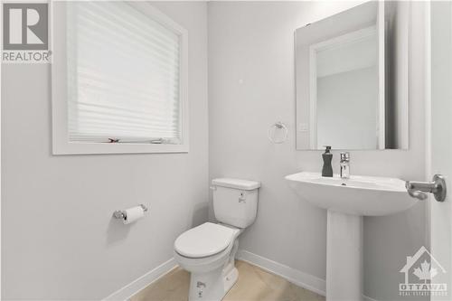 main floor powder room - 717 Fenwick Way, Ottawa, ON - Indoor Photo Showing Bathroom