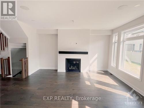 554 Tenor Ridge, Ottawa, ON - Indoor Photo Showing Living Room With Fireplace