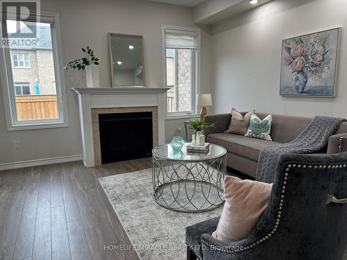 80 Workmen'S Circle, Ajax, ON - Indoor Photo Showing Living Room With Fireplace