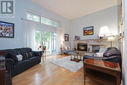 1 Windy Golf Way, Toronto, ON - Indoor Photo Showing Living Room With Fireplace