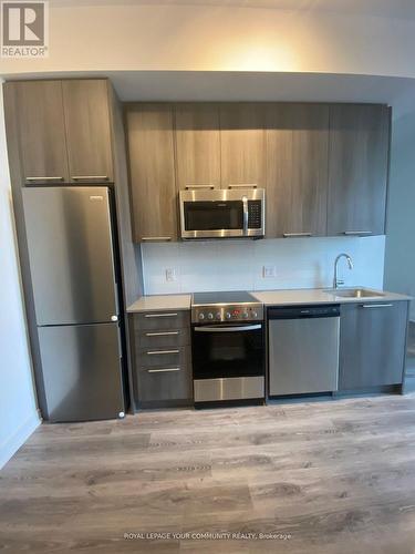 103 - 25 Neighbourhood Lane, Toronto, ON - Indoor Photo Showing Kitchen With Stainless Steel Kitchen