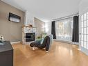 Salon - 1529 Rue Des Chênaies, Boisbriand, QC  - Indoor Photo Showing Living Room With Fireplace 