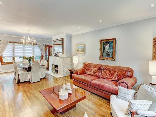 Living room - 397 Av. Glengarry, Mont-Royal, QC - Indoor Photo Showing Living Room With Fireplace