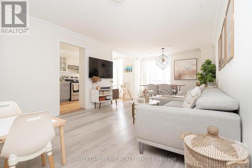 1003 - 2470 Eglinton Avenue W, Toronto, ON - Indoor Photo Showing Living Room